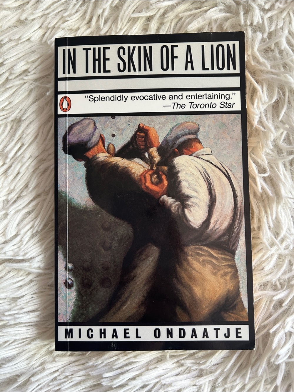In the Skin of a Lion by Michael Ondaatje, paperback pocket size